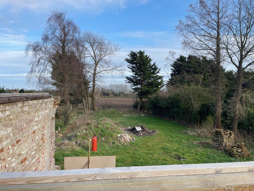Lot: 101 - COTTAGE RENOVATION PROJECT WITH PLANNING IN VILLAGE LOCATION - view of the garden to the rear from first floor level